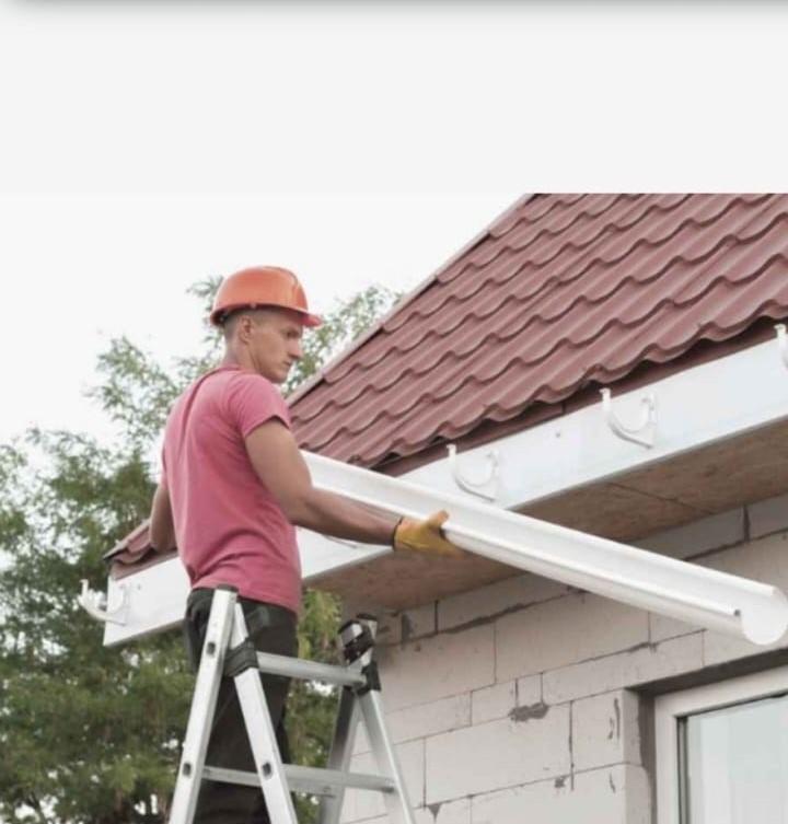 Builder doing a Gutter Installation